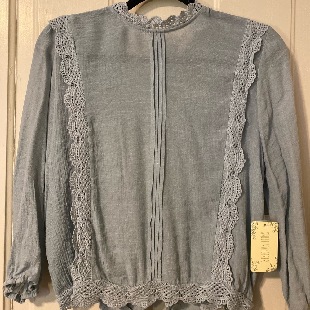 Blue long sleeve summer shirt.